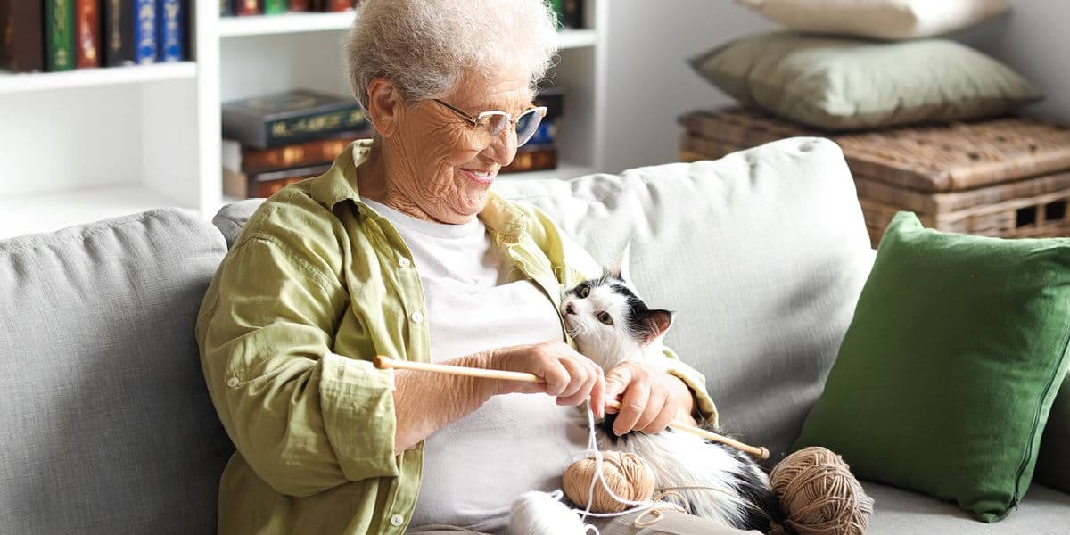 senior woman and cat