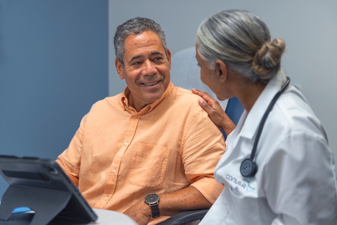 In-center hispanic man individual appointment with provider