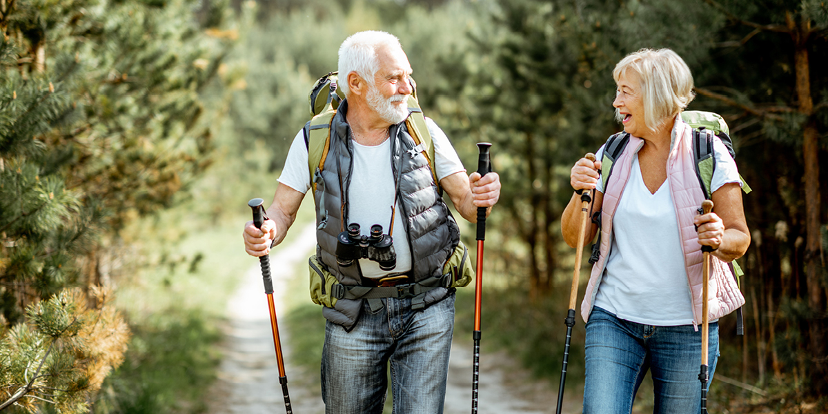 Senior man and woman exploring the outdoors