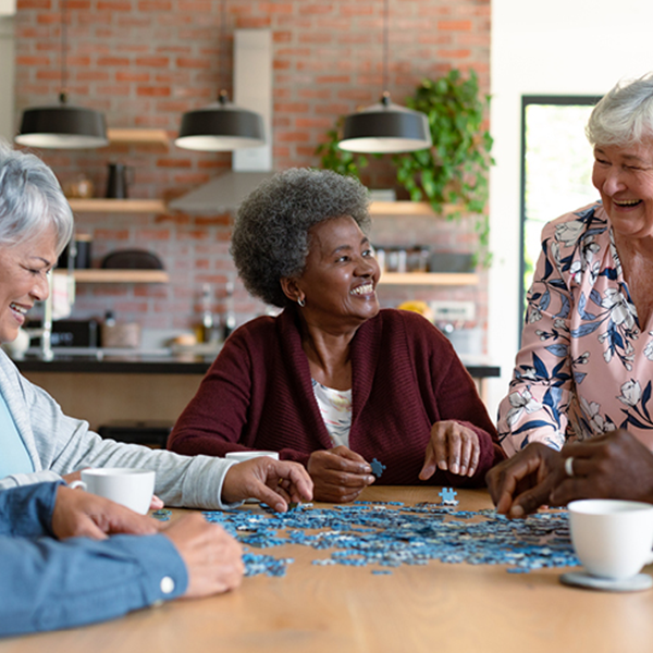seniors putting together a puzzle